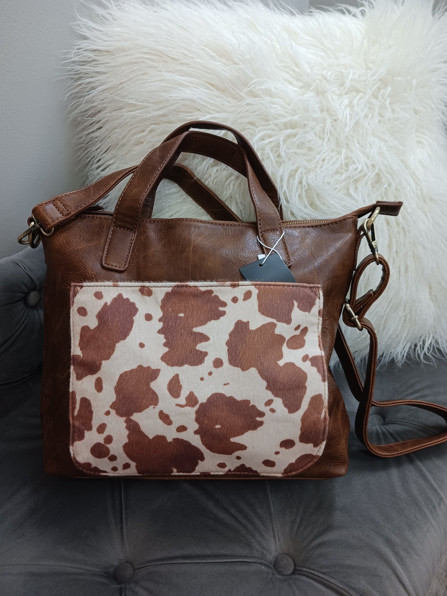 Faux Cow Hide Pocket Convertible Tote by Joy Susan